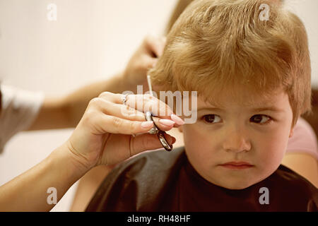 Haircut that your kid will love. Cute boys hairstyle. Kids hair salon.  Little child given haircut. Small child in hairdressing salon. Little boy  with Stock Photo - Alamy