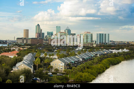 Low aerial view of downtown Tampa, Florida with expensive waterfront homes in foreground. Stock Photo