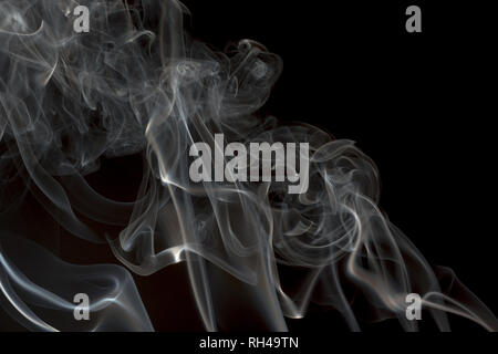 Smoke on a black background. Smoke movement patterns of background graphics. Stock Photo