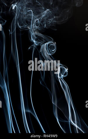 Smoke on a black background. Smoke movement patterns of background graphics. Stock Photo