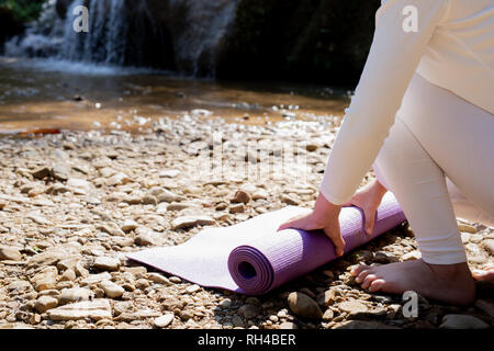 beautiful slim woman in yoga pants standing on porch Stock Photo - Alamy