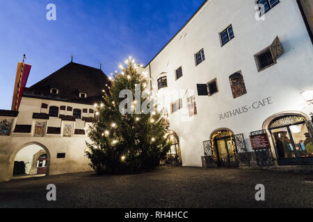 HALL IN TIROL, AUSTRIA - DECEMBER 2018: night view of the town old center. Stock Photo