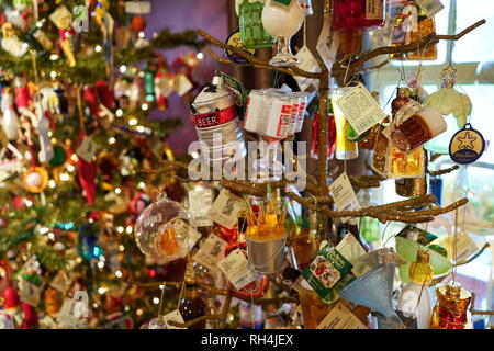 Wilton, CT USA. Nov 2018. Unique alcohol theme Christmas ornaments at The Historical Christmas Barn. Stock Photo