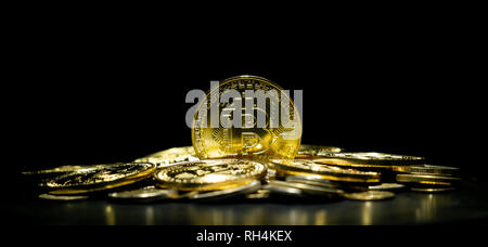 golden bitcoin cryptocurrency in dark background Stock Photo