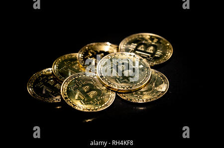 golden bitcoin cryptocurrency in dark background Stock Photo