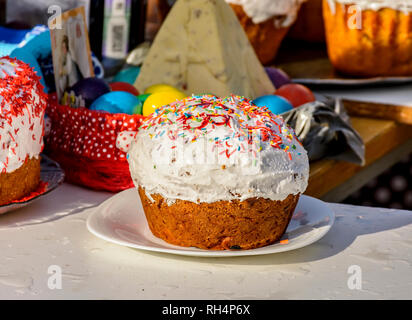 The consecration of eggs and cakes near the Church-chapel of the Intercession of the blessed virgin in Rybatsky in St. Petersburg on April 07, 2018. Stock Photo