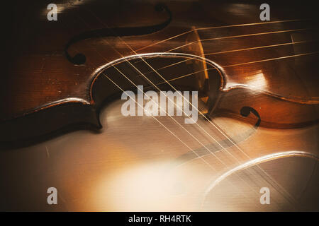 Abstract composition of an old cello parts, blended structure and wood texture details. Stock Photo