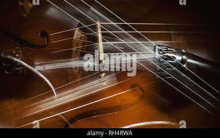 Abstract composition of an old cello parts, blended structure and wood texture details. Stock Photo