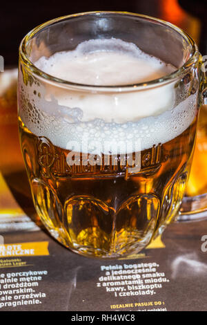 PHOTOGRAPH 250ml glass of Pilsner Urquell Czech lager beer, in branded glass, Gdańsk, Poland Stock Photo