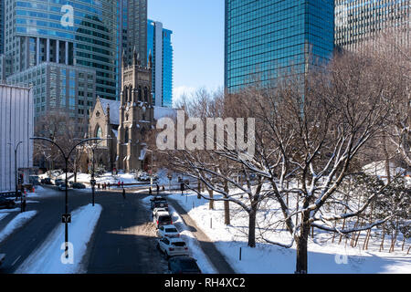 St George Anglican Church surrounded by skyscrapers Stock Photo