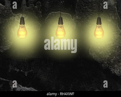 Three yellow illuminated light bulbs against black wall background Stock Photo