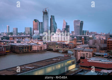 Panoramic view of London skyscrapers in the financial district in the evening, after sunset. View from Tate Modern museum. Stock Photo