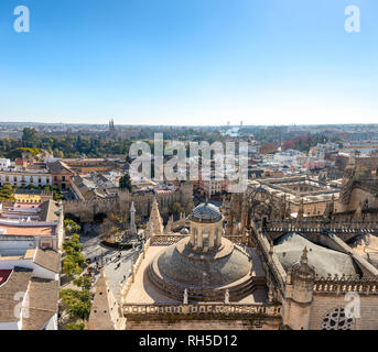 Aerial view of Seville city and Cathedral of Saint Mary of the See in Seville as seen from seen from the Giralda tower. With Royal AlcÃ¡zar of Seville Stock Photo