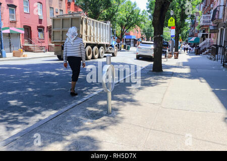 Orthodox Jewish woman Wearing Special Clothes on Shabbat, in Williamsburg, Brooklyn, New York Stock Photo