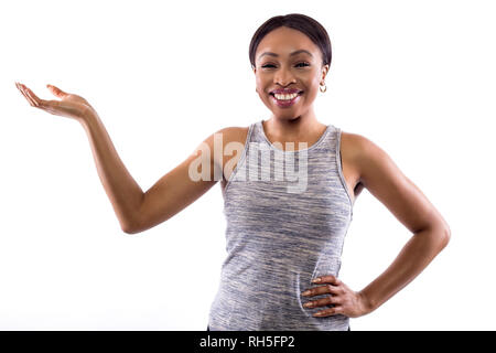 Black female wearing athletic outfit on a white background as a fitness  trainer feeling sick Stock Photo - Alamy