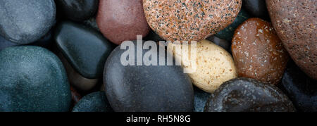 Web banner abstract smooth round wet pebbles sea texture background, spa concept Stock Photo