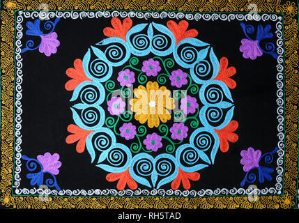 Traditional Tajik colorful embroidery – suzani, carpet. Outlook world culture festival. October 27, 2018. Kiev, Ukraine Stock Photo