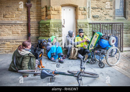 Blackpool, Lancashire, UK. 1st February, 2019. UK Weather: Cold day in Blackpool as recently evicted people gather at St Johns Church to see if the church will offer accommodation overnight.  The church will admit rough sleepers if the temperature falls below freezing and then only to under 25's.  Unit the decision is made homeless people gather outisde waiting for the decision. Credit: MediaWorldImages/Alamy Live News Stock Photo