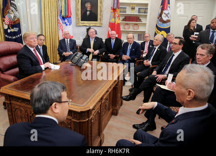 United States President Donald J. Trump, and, from left, US Vice President Mike Pence, US Secretary of State Mike Pompeo, US Secretary of Commerce Wilbur L. Ross, Jr., Director of Trade and Industrial Policy, Director of the White House National Trade Council Peter Navarro, United States Secretary of the Treasury Steven T. Mnunchin, and United States Trade Representative Robert Lighthizer, meet with, Liu He, Member of the Political Bureau of the Central Committee of the Communist Party of China and Vice Premier of the Peopleís Republic of China and Wang Shouwen, Vice Minister of Commerce of th Stock Photo