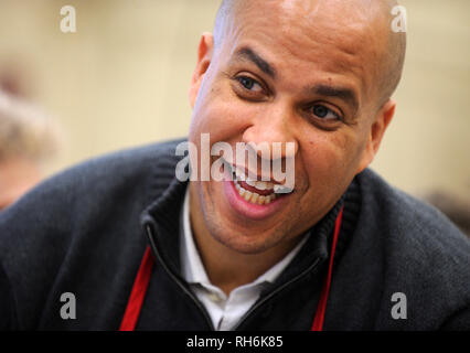 ***FILE PHOTO*** Cory Booker Announces 2020 Presidential Bid PERTH AMBOY, NJ - NOVEMBER 27- U.S. Sen. Cory Booker is joined by his mother, Carolyn, for a series of Thanksgiving week service events in Perth Amboy, NJ .Perth Amboy Senior Center Thanksgiving Lunch. Photo Credit: VanTine /MediaPunch Stock Photo