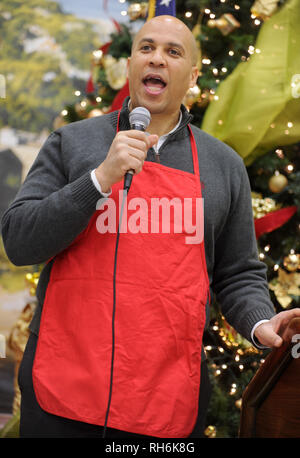 ***FILE PHOTO*** Cory Booker Announces 2020 Presidential Bid PERTH AMBOY, NJ - NOVEMBER 27- U.S. Sen. Cory Booker is joined by his mother, Carolyn, for a series of Thanksgiving week service events in Perth Amboy, NJ .Perth Amboy Senior Center Thanksgiving Lunch. Photo Credit: VanTine /MediaPunch Stock Photo