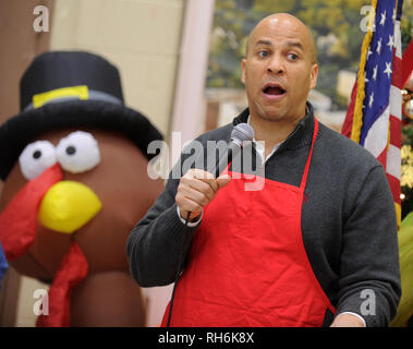 ***FILE PHOTO*** Cory Booker Announces 2020 Presidential Bid PERTH AMBOY, NJ - NOVEMBER 27- U.S. Sen. Cory Booker is joined by his mother, Carolyn, for a series of Thanksgiving week service events in Perth Amboy, NJ .Perth Amboy Senior Center Thanksgiving Lunch. Photo Credit: VanTine /MediaPunch Stock Photo