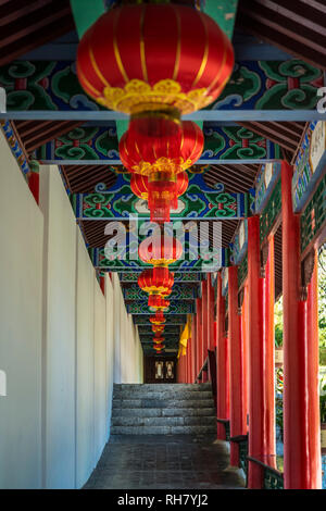 Corridor with red lanterns leading to the Jade Garden, Mu’s Residence, the mansion of the Mu family, Old Town of Lijiang, Yunnan province, China Stock Photo