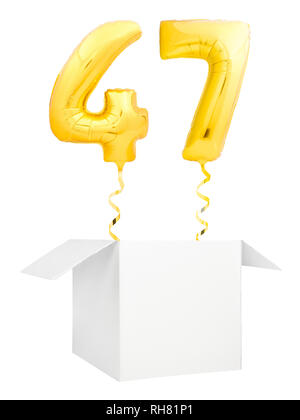 Golden number forty seven inflatable balloon with golden ribbon flying out of blank white box isolated on white background Stock Photo