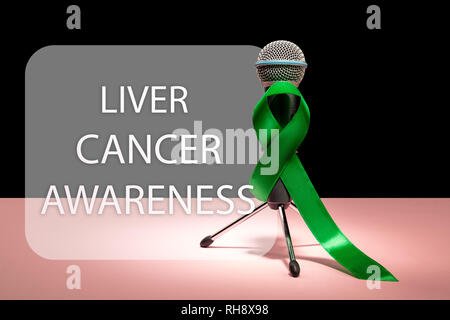 Liver Cancer and Hepatitis B - HVB Awareness month ribbon, Emerald Green or Jade ribbon awareness color on pink background. The cancer, health, help, care, support, hope, illness, survivor, healthcare concept