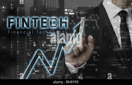 Fintech concept is shown by businessman. Stock Photo