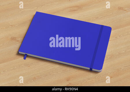 Blue horizontal notebook with elastic band on wooden background Stock Photo
