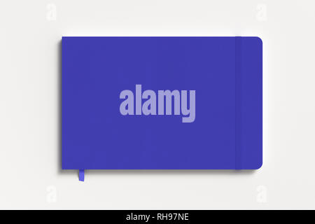 Blue horizontal notebook with elastic band on white background Stock Photo