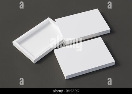 Blank opened and closed white flat slide gift box mock up on black leather background Stock Photo