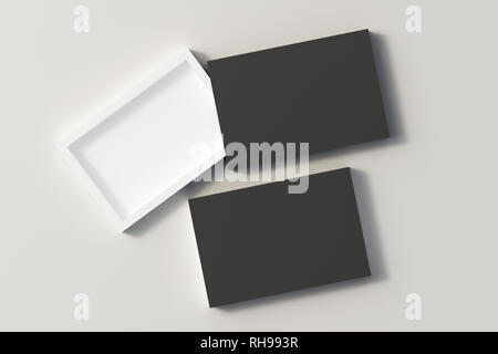 Blank opened and closed black flat slide gift box mockup on white background Stock Photo