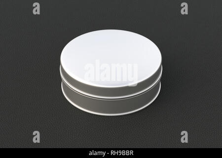 Blank silver beauty cosmetic container or cream jar on black background. With clipping path around container Stock Photo