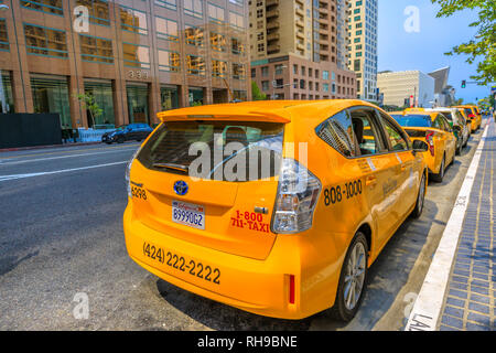 Los Angeles, California, United States - August 9, 2018: Taxi drivers wait in downtown on Grand Avenue, next to MOCA, Museum of Contemporary Art Stock Photo