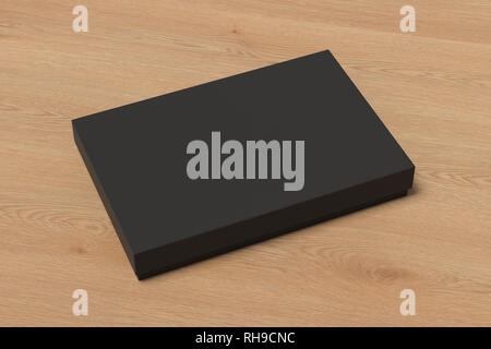 Blank black flat gift box mock up on wooden background. With clipping path around box. Stock Photo