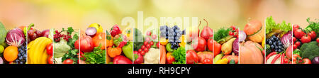 Healthy vegetables and fruits on multicolored blurred background. Top view. Copy space Stock Photo