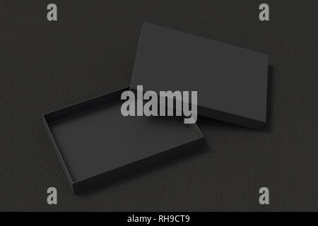 Blank open black flat gift box mock up on black background. With clipping path around box. Stock Photo