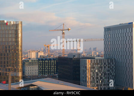 Construction Cranes and the Famous Skyline of Vienna, Austria, in the Morning Stock Photo