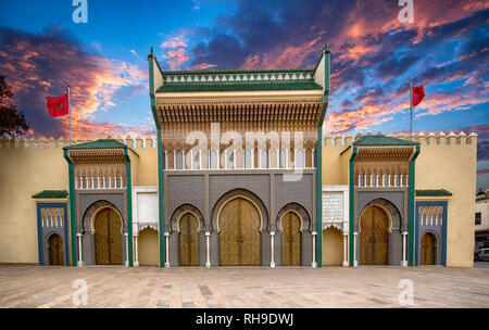 Beautiful view of Bab Majzen door of ornate golden metal on the entrance gates to the Royal Palace in Fes, Morocco ( Fez ). Ornamented geometric Stock Photo