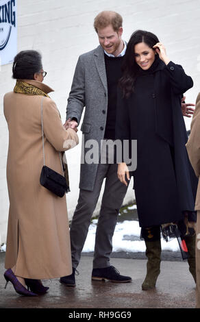 The Duke and Duchess of Sussex bid farewell to Peaches Golding, the Lord Lieutenant of Bristol (left) as they leave following a visit to Empire Fighting Chance in Easton, Bristol, where the charity uses boxing to support children failing at school and in danger of drifting into a life of unemployment or even crime. Stock Photo