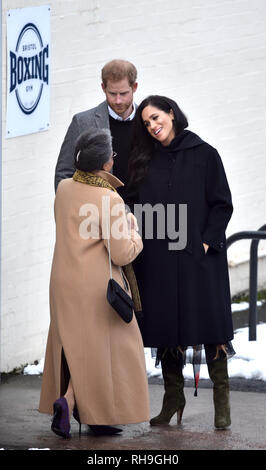 The Duke and Duchess of Sussex bid farewell to Peaches Golding, the Lord Lieutenant of Bristol (left) as they leave following a visit to Empire Fighting Chance in Easton, Bristol, where the charity uses boxing to support children failing at school and in danger of drifting into a life of unemployment or even crime. Stock Photo