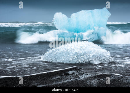 longexposure image of two icebergs at Diamond Beach at Jökulsárlón Stock Photo
