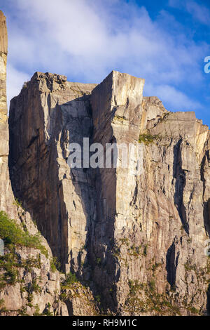 Preikestolen or Prekestolen (Preachers Pulpit, Preachers Chair or Pulpit Rock) steep cliff as seen from Lysefjord (Lysefjorden) fjord, a major tourist Stock Photo