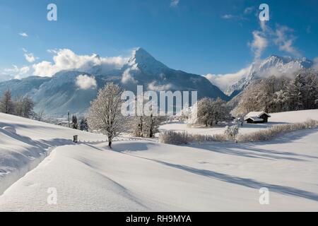 Winter landscape with view of the Watzmann, Hochkalter on the right, Bischofswiesen National Park Berchtesgaden Stock Photo