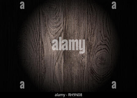 wood texture for a background with a vertical arrangement of a drawing board and circular illumination in the center Stock Photo