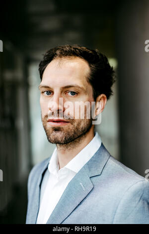 serious businessman looking into the camera Stock Photo