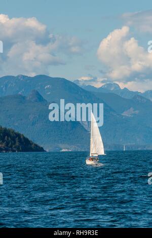 Sailboat on the sea, Howe Sound, near Vancouver, British Columbia, Canada Stock Photo