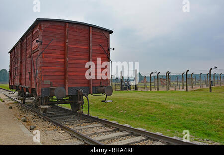 A train car on the unloading platform at the Birkenau-Auschwitz concentration camp, a symbol of the deportation of Jews from Hungary to Auschwitz in m Stock Photo